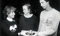 APTA Executive Director, Gloria Dillenbeck, presenting 1975 National Boy's finalist prizes to Bill Hammer and Kent Pierce