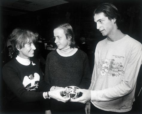 APTA Executive Director, Gloria Dillenbeck, presenting 1975 National Boy's finalist prizes to Bill Hammer and Kent Pierce