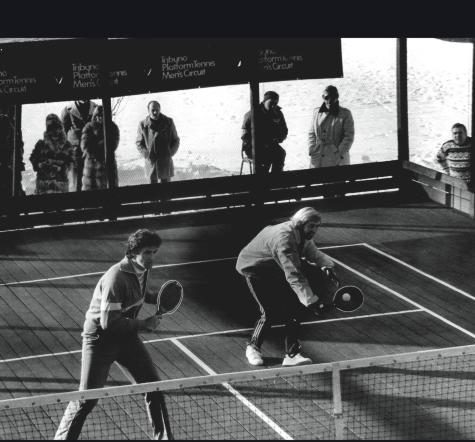 During one of the Tribuno Tour events, Hank Irvine hits a service volley while Herb Fitz Gibbon closes in on the center. This team dominated several of the Tribuno tournaments and won the Nationals in both 1977 and 1978.