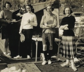 Pamela McCrae (second from right) at a Fox Meadow women's tea in the 1950s. Buffy Briggs is on the left. The two others in the front are Elise Clairborne and Evie Carlisle (far right)